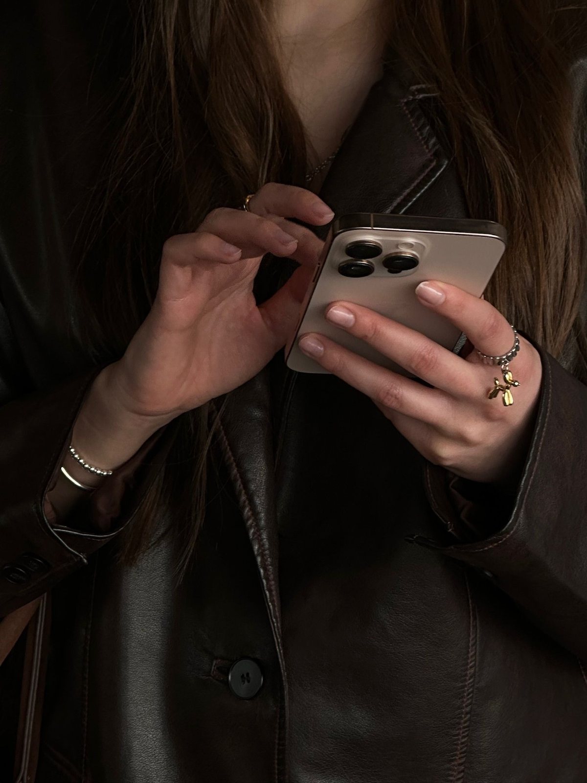 Woman typing on her phone